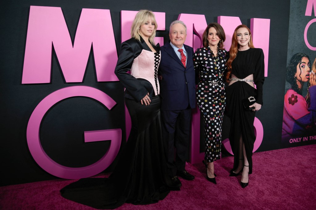 (Left to right) Reneé Rapp, Lorne Michaels, Tina Fey, and Lindsay Lohan pose Monday on the carpet. 