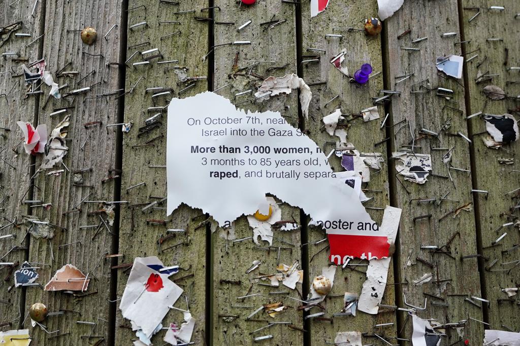 A torn off hostage poster on a campus billboard at the University of Pennsylvania.