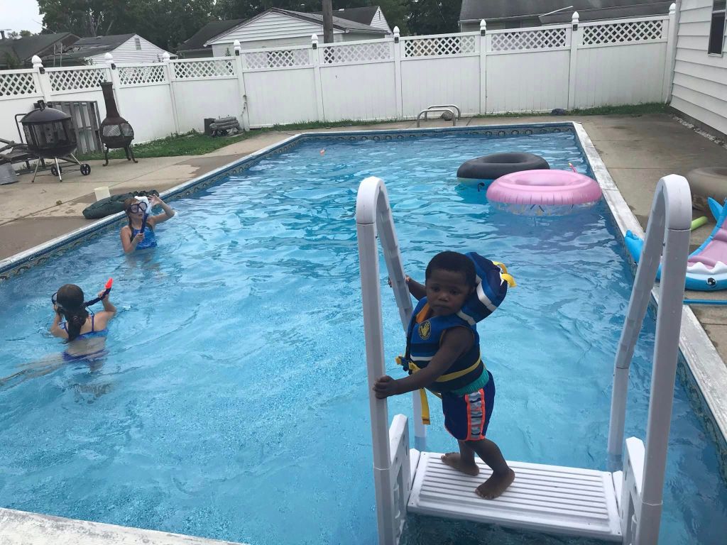 Darnell on a pool ladder. 