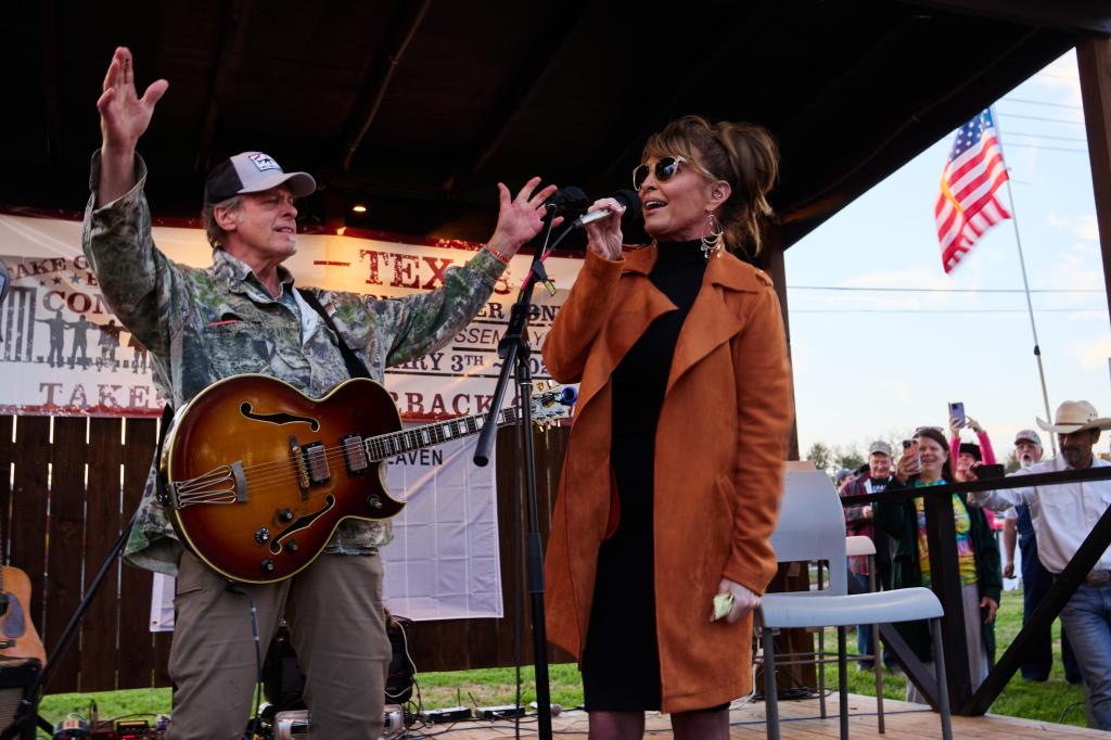 Sarah Palin joined Ted Nugent on stage.