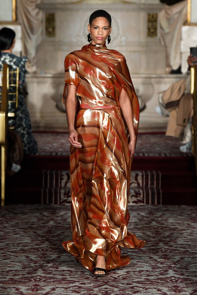 A shimmery orange Christian Siriano gown