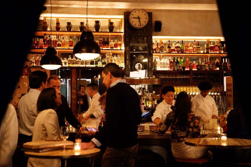 Bar scene with several customers at Smith & Mills.