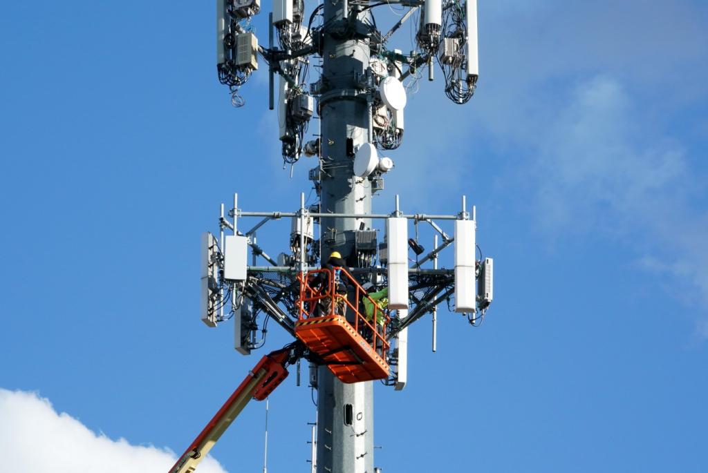 A general view of workers performing maintenance on a cell phone tower as seen in Hawthorne, NJ on October 18, 2022.