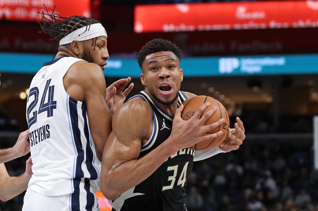 Giannis Antetokounmpo goes to the basket against Lamar Stevens during the first half at FedExForum on February 15, 2024.