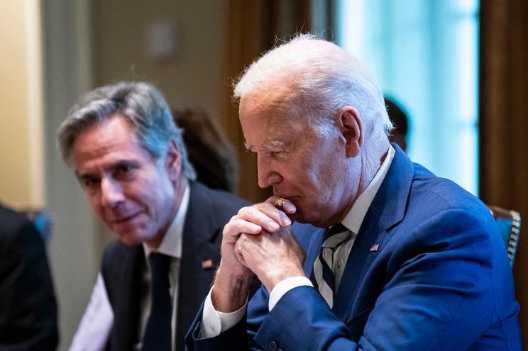 United States Secretary of State Antony Blinken listens to US President Joe Biden speaking in the Cabinet Room of the White House.