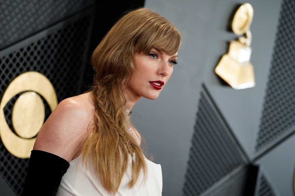 Taylor Swift arrives at the 66th annual Grammy Awards on Feb. 4, 2024.