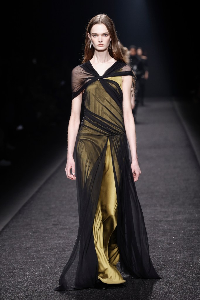 A model wearing a dress in the Alberta Ferretti Ready to Wear Fall/Winter 2024-2025 fashion show.