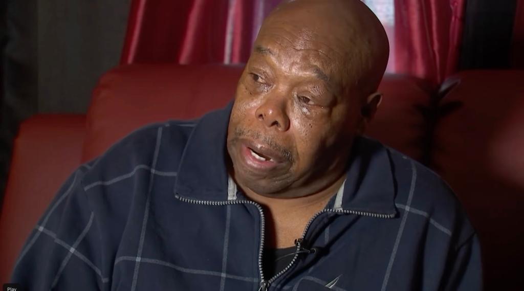 Darnell's biological grandfather crying. 