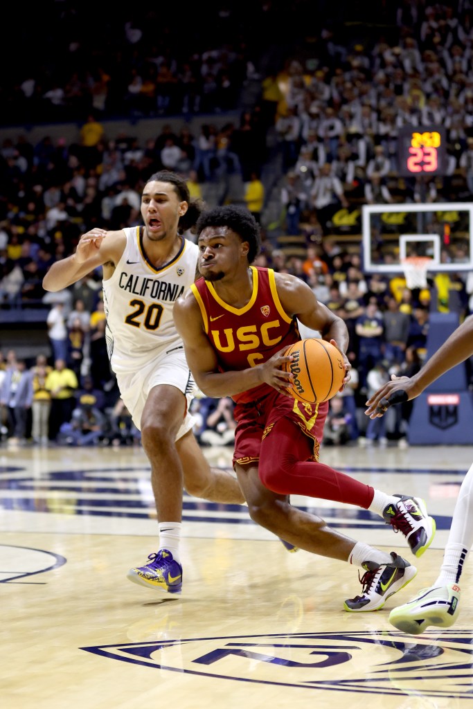 USC guard Bronny James is guarded by Jaylon Tyson #20 of the California Golden Bears in the first half at Haas Pavilion on February 7, 2024 in Berkeley, California.  