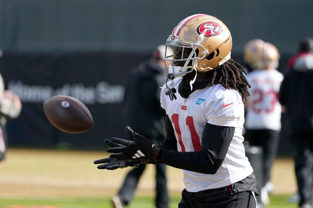  49ers wide receiver Brandon Aiyuk (11) catches a pass during practice