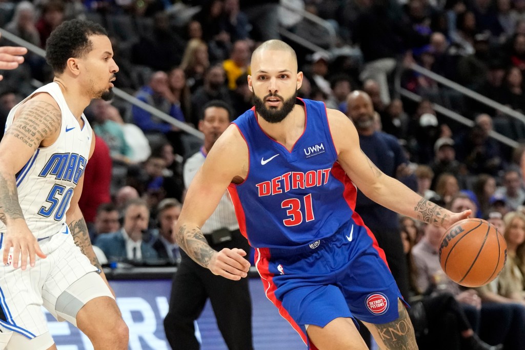 Ex-Knick Evan Fournier drives to the basket for the Pistons.