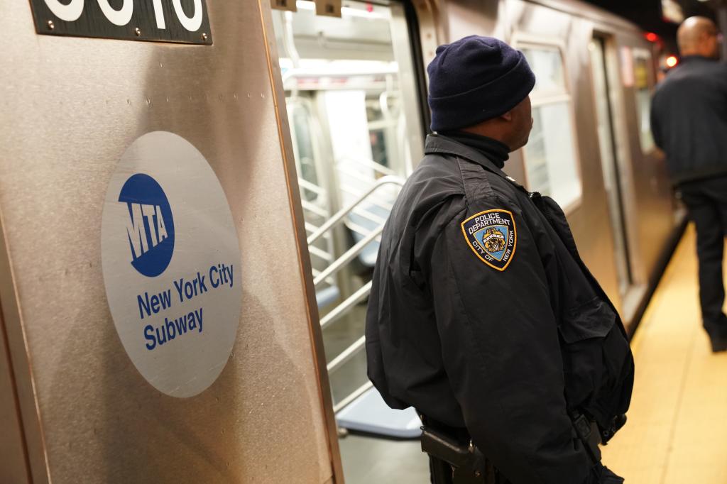 Police at the scene where a person was stabbed on a subway train at W72nd Street at Broadway in New York, NY around 11:15 p.m. on October 19, 2022.