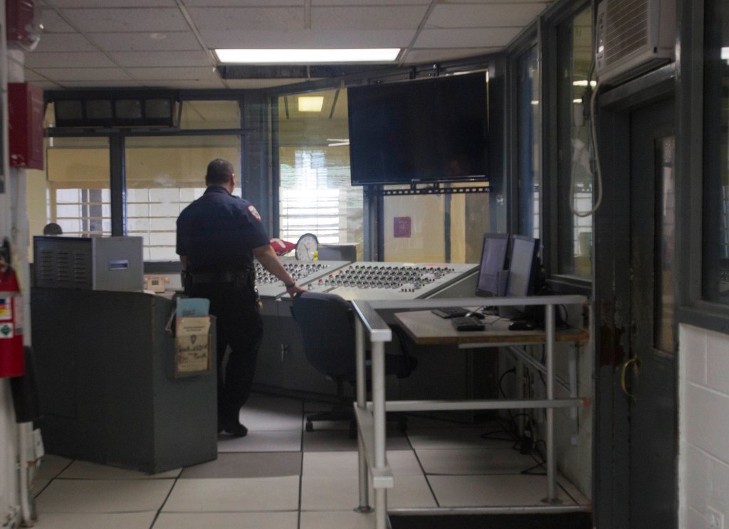 A guard works inside the jail. 