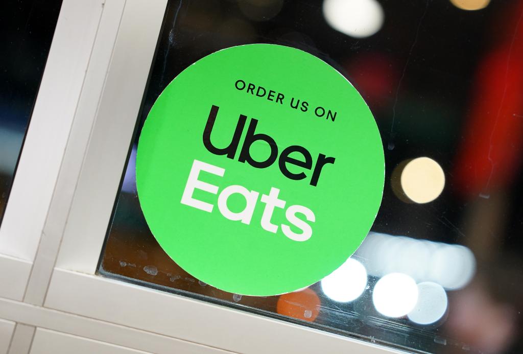 An Uber Eats sign in a window in New York City. Picture taken by Christopher Sadowski on February 21, 2024.