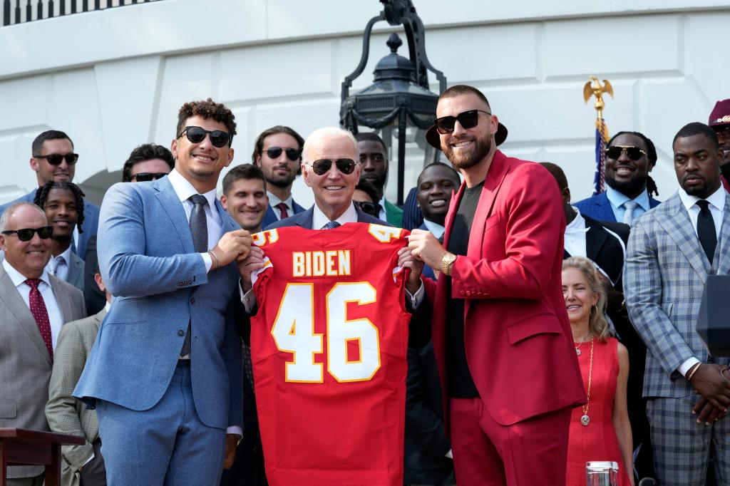 Kansas City Chiefs quarterback Patrick Mahomes and Kansas City Chiefs tight end Travis Kelce present President Joe Biden with a jersey as he welcomed the Kansas City Chiefs football team to the White House in Washington, Monday, June 5, 2023, to celebrate their championship season and victory in Super Bowl LVII. 