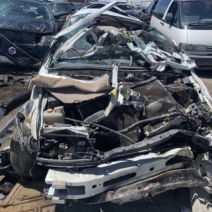 The teen says the car hit a telephone pole before flipping and rolling over while all three friends were ejected from the vehicle. 