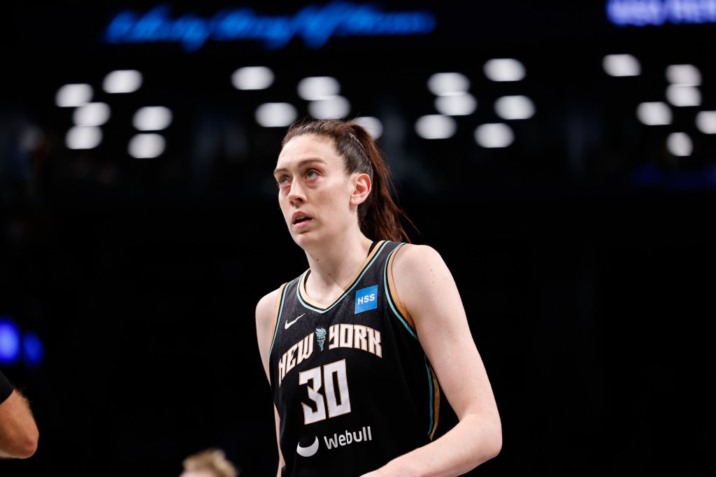 Breanna Stewart #30 of New York Liberty in basketball uniform reacting during game against Las Vegas Aces in 2023 WNBA Finals.