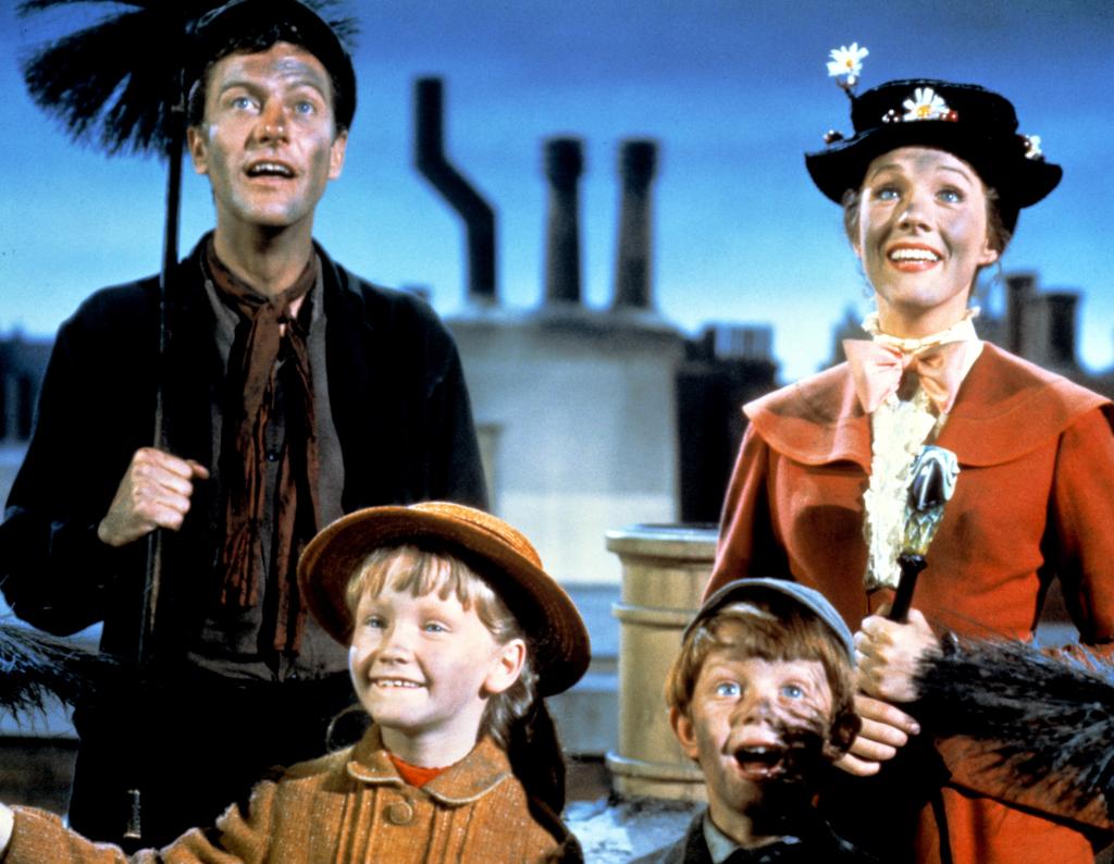 Dick Van Dyke, Julie Andrews, Karin Dotrice and Matthew Garber in a scene from "Mary Poppins" (1964)