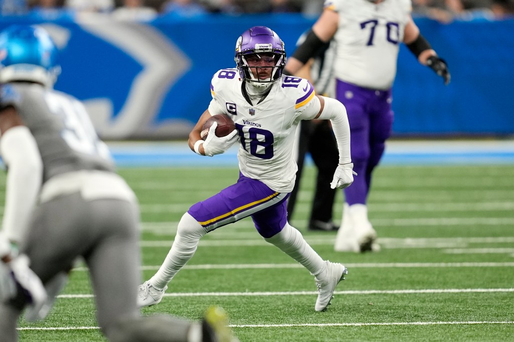 Minnesota Vikings wide receiver Justin Jefferson runs during the first half of an NFL football game against the Detroit Lions, Sunday, Jan. 7, 2024, in Detroit.  