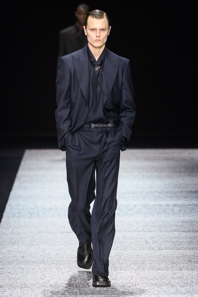 A model in a black suit for Armani