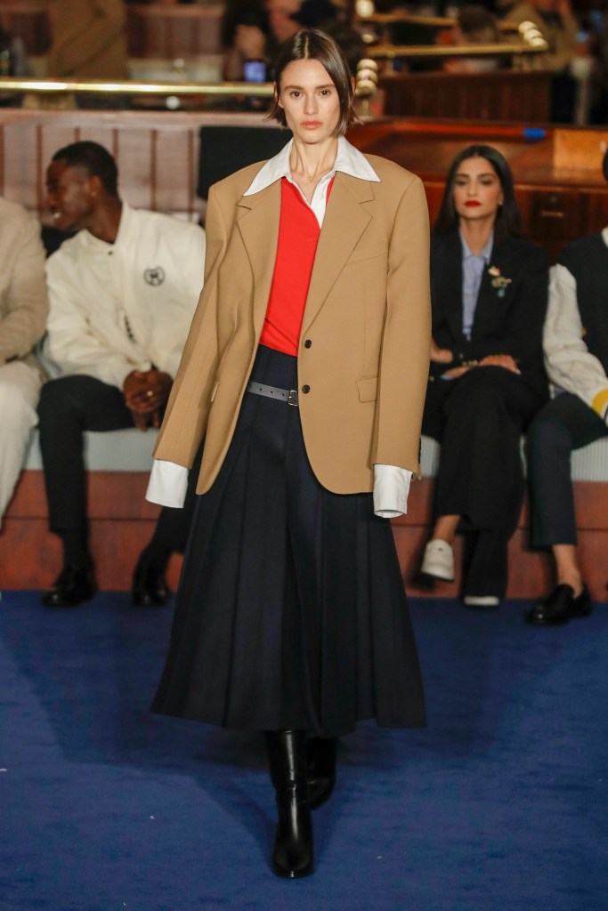 A Red blouse, black skirt, and tan blazer at Tommy Hilfiger