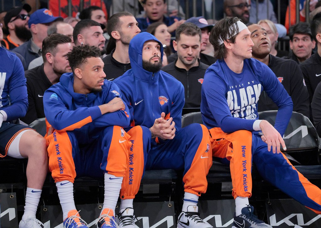 Evan Fournier sits on the bench for the Knicks.