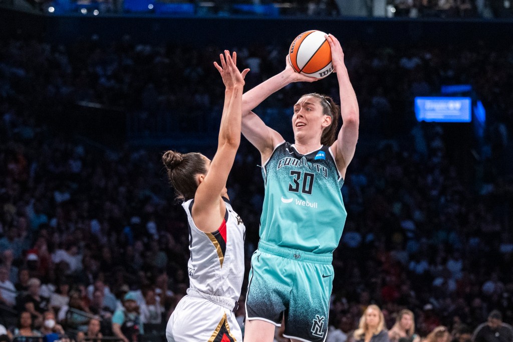 Breanna Stewart shooting a jump shot in a basketball game at Barclays Center with the Las Vegas Aces.