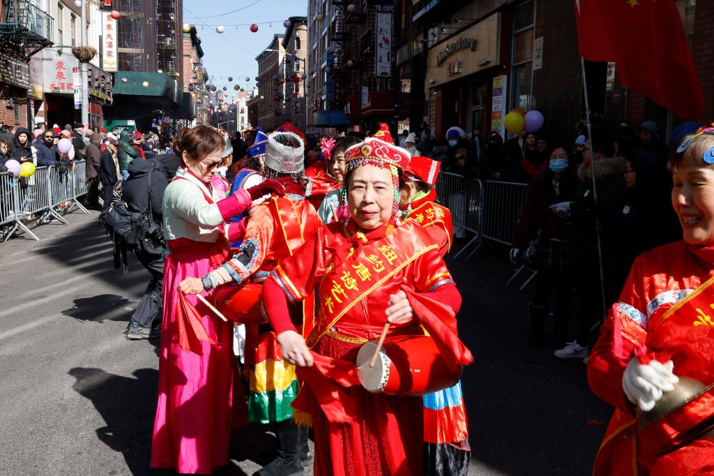 People in costume for the parade in Chinatown.