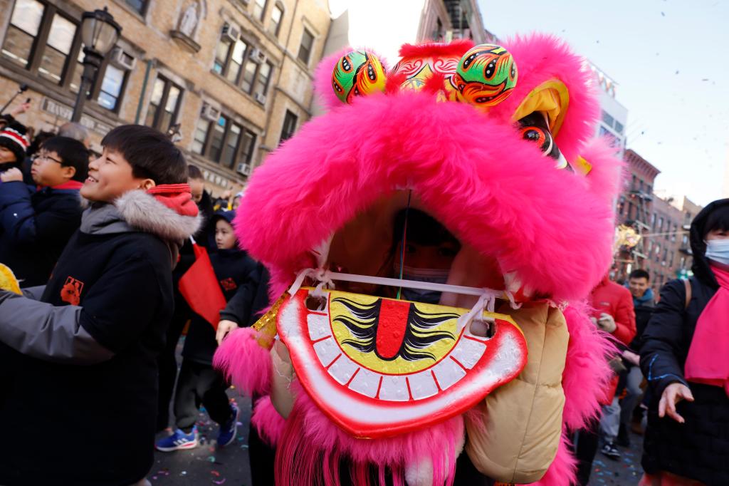 A pink dragon float.