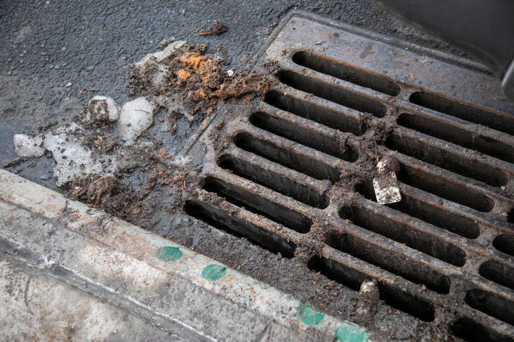 A storm drain on 6th Avenue and Prospect Avenue in Brooklyn, emitting a foul smell.