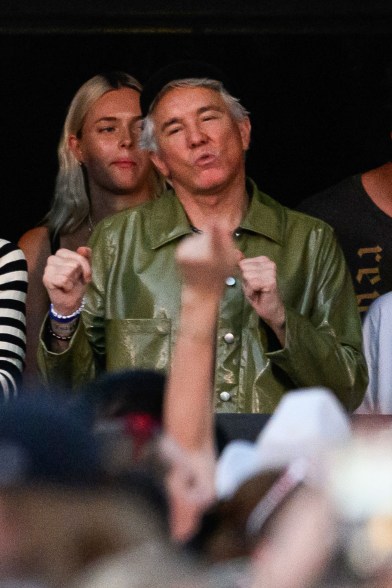 Baz Luhrmann observed on stage with a woman in background during Taylor Swift's 'The Eras Tour', Accor Stadium, Sydney, Australia - 23 Feb 2024.