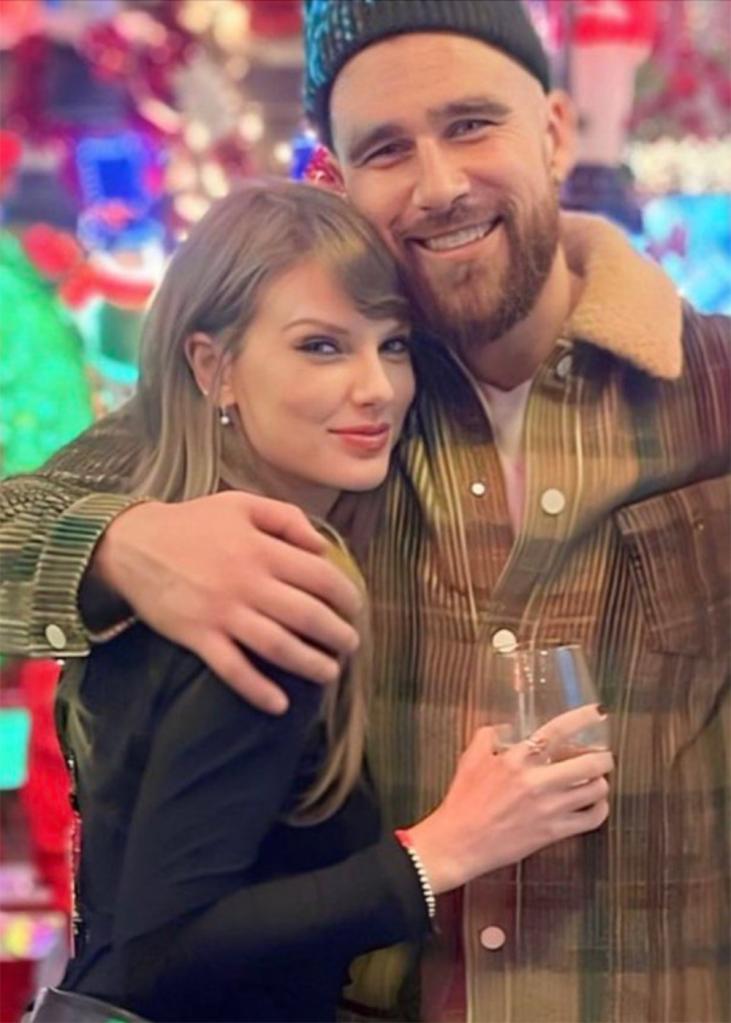 Taylor Swift and Travis Kelce at a bar together in Kansas City in December 2023. 