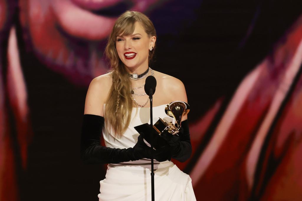 Taylor Swift accepts the Grammy for Best Pop Vocal Album on Feb. 4, 2024.