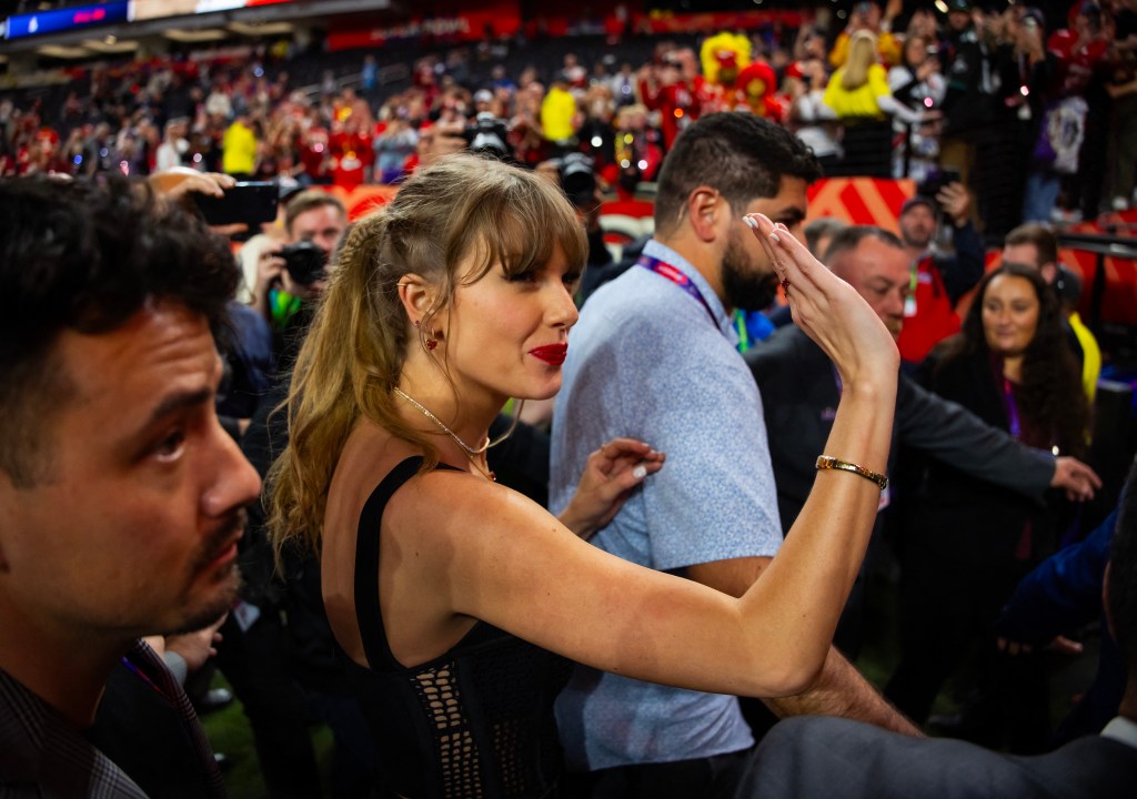 Taylor Swift on the field after the Kansas City Chiefs defeated the San Francisco 49ers in Super Bowl 2024.