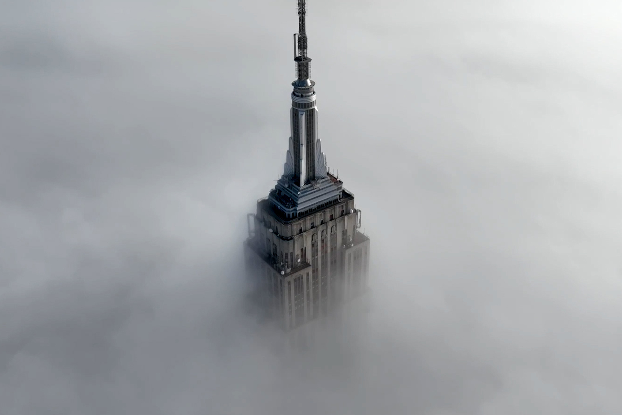 Empire State Building swallowed up by thick fog: drone video