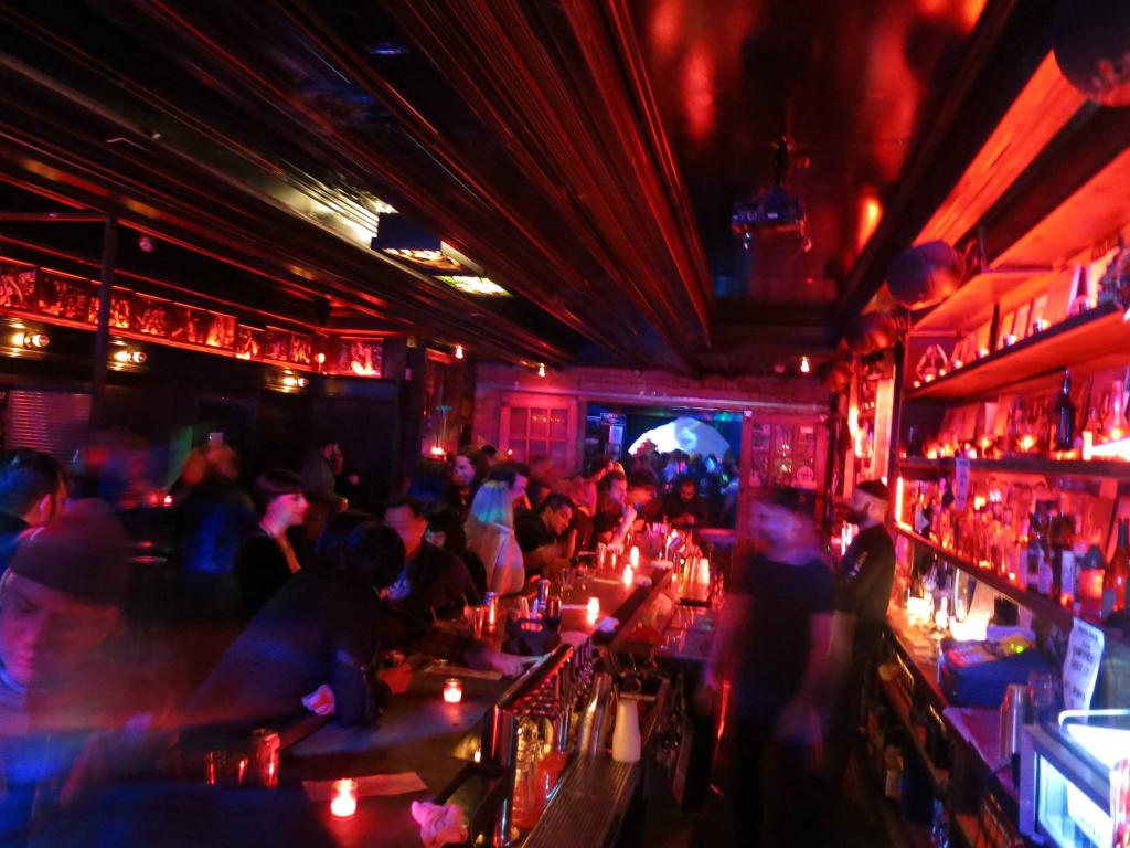 Red-lit interior of bar inside Saint Vitus