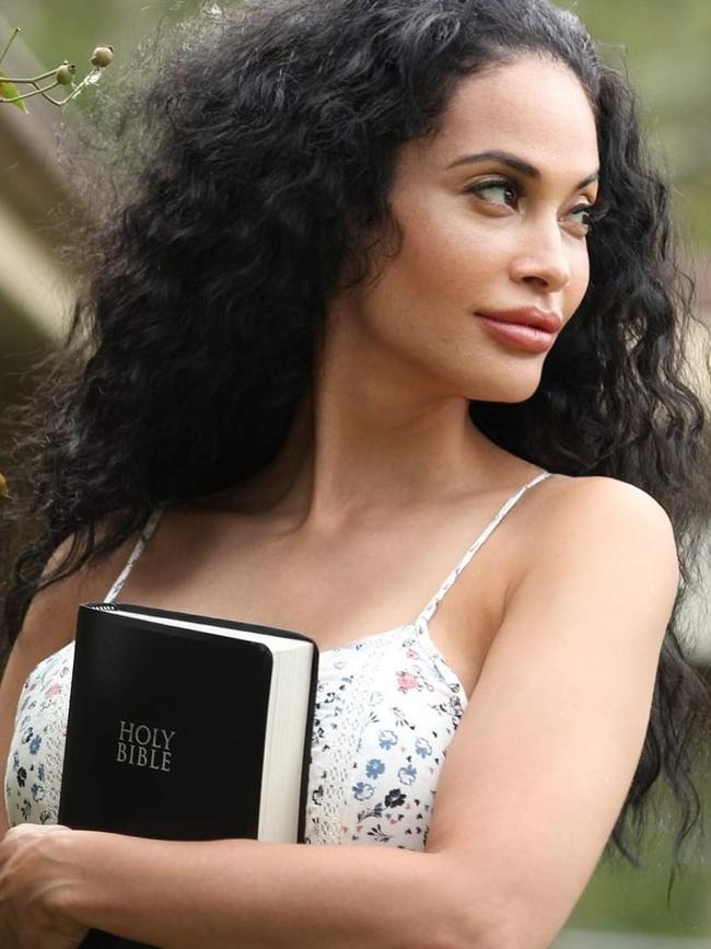 Woman holding bible