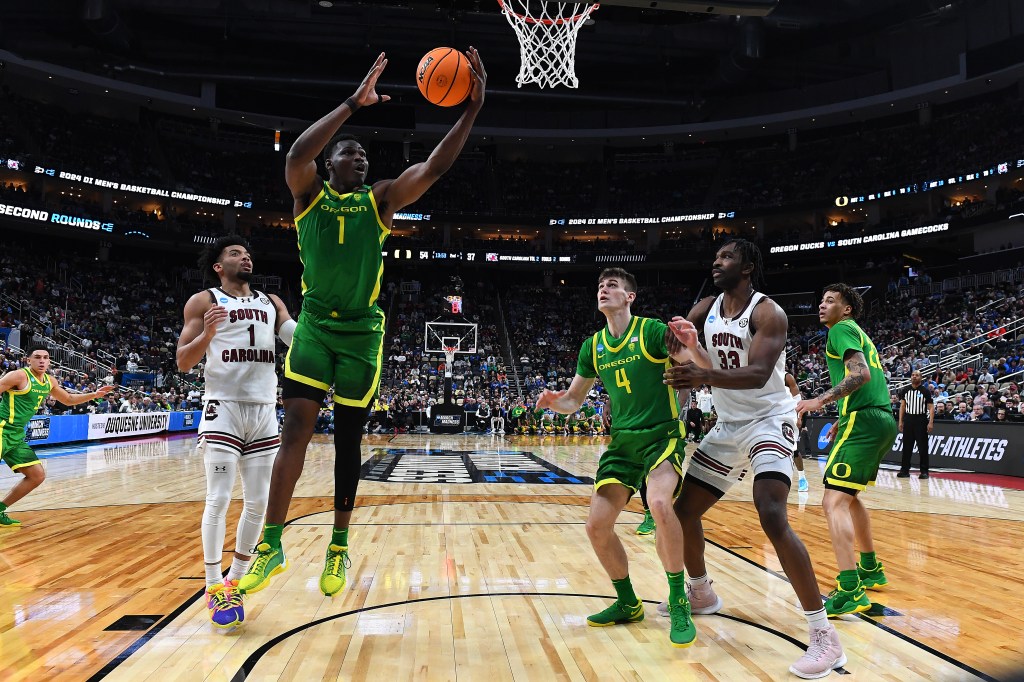 N'Faly Dante #1 of the Oregon Ducks rebounds against the South Carolina Gamecocks