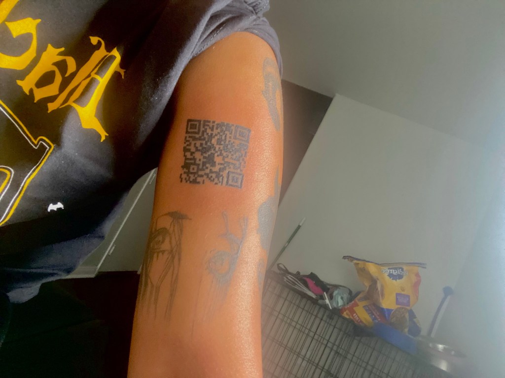 She got the QR tattoo in June 2022 to one-up her friends on the Rickroll joke.