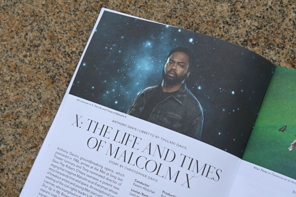 Malcolm X production page of Metropolitan Opera House's 2023-2024 season brochure featuring a man; photo by Helayne Seidman.