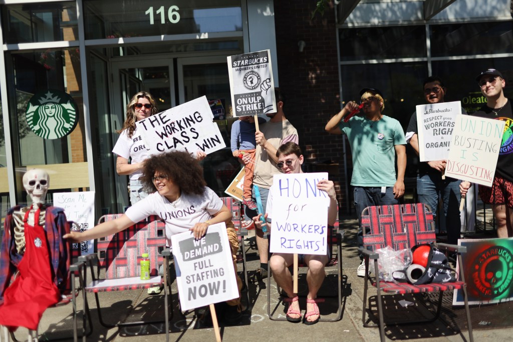 People picketing in front of a Starbucks store in Greektown neighborhood in Chicago, Illinois over Pride decorations ban.