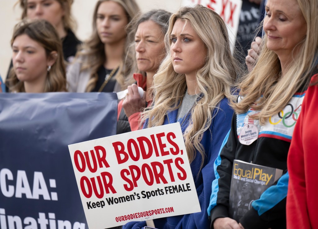  Former University of Kentucky swimmer Riley Gaines, second from right, stands during a rally on Thursday, Jan. 12, 2023, outside of the NCAA Convention in San Antonio