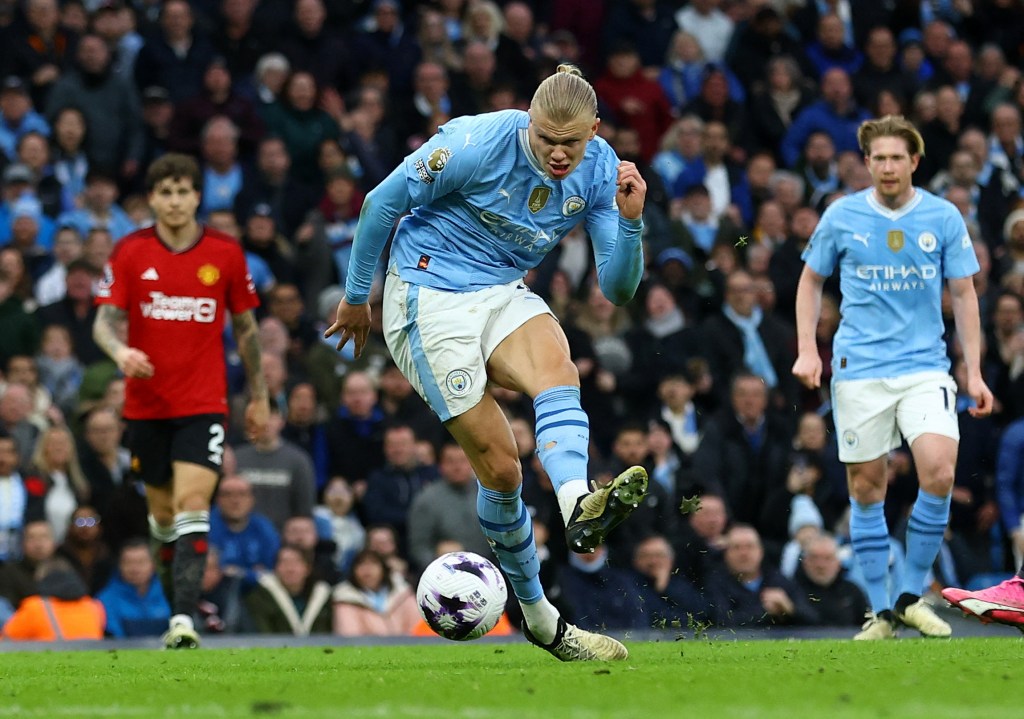 Erling Braut Haaland scores Manchester City's third goal against Manchester United at Etihad Stadium in Premier League match.