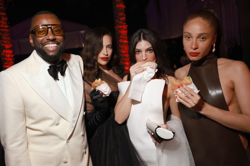 Emily Ratajkowski, Irina Shayk and two others pose for a photo at 2024 Vanity Fair Oscar party hosted by Radhika Jones in Beverly Hills.