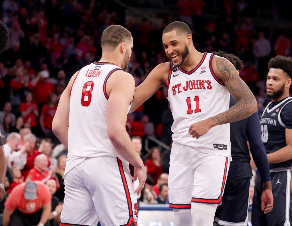 Chris Ledlum #8 of the St. John's Red Storm greets Joel Soriano #11 of the St. John's Red Storm during the second half when the St. John's Red Storm played the Georgetown Hoyas Saturday, March 9, 2024 at Madison Square Garden in Manhattan, NY.