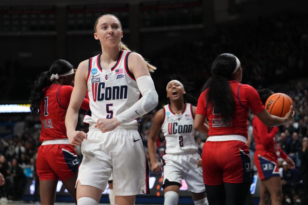 Paige Bueckers #5 of the Connecticut Huskies reacts against the Jackson State Tigers during the first half of a first round NCAA Women's Basketball Tournament game