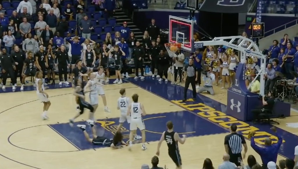 KJ Johnson watches as his shot goes in.