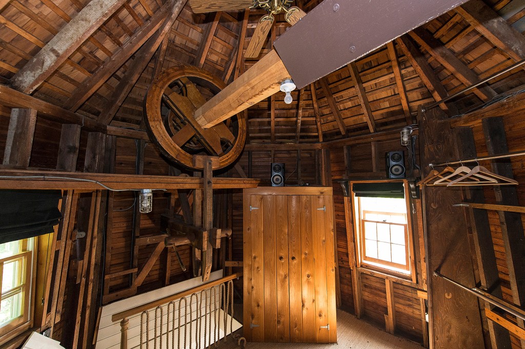 This top-level space still houses the windmill's mechanicals -- and, sheathed in cedar, can today be a great closet.