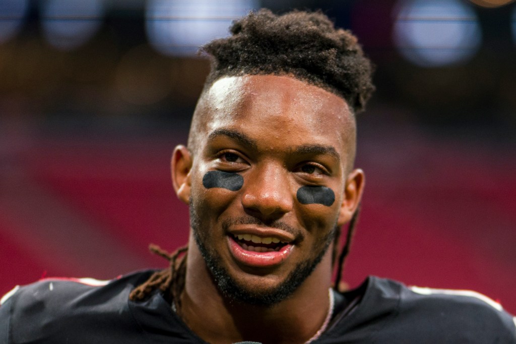 Atlanta Falcons running back Bijan Robinson (7) is interviewed after an NFL football game against the Carolina Panthers, Sunday, Sep. 10, 2023, in Atlanta.  