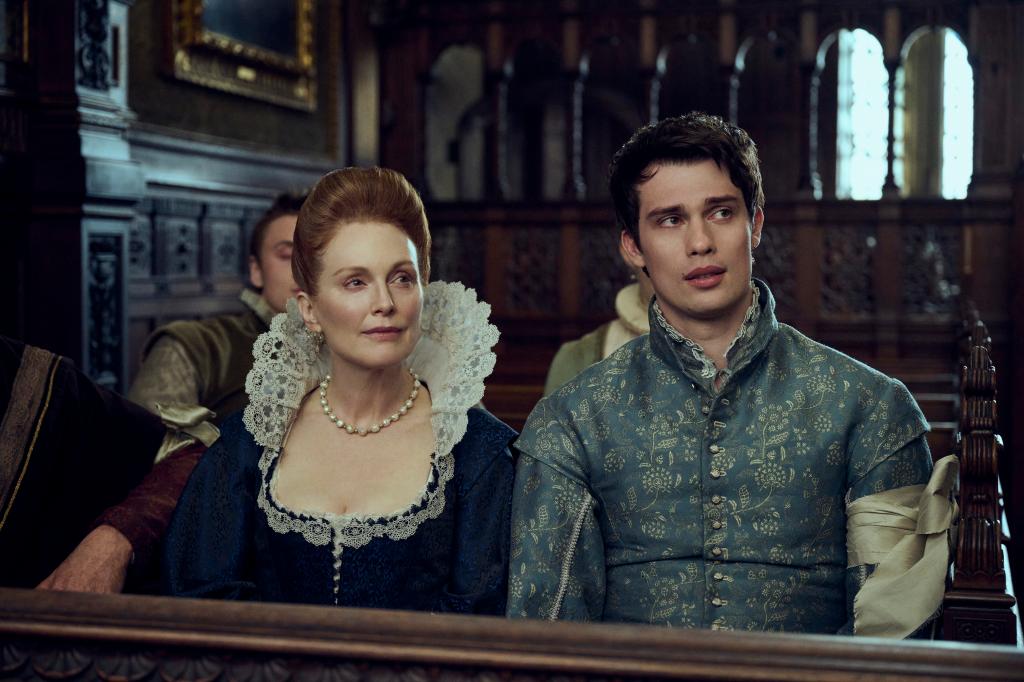 Julianne Moore as Mary and Nicholas Galitzine as George, sitting next to each other in 1600s clothes. 